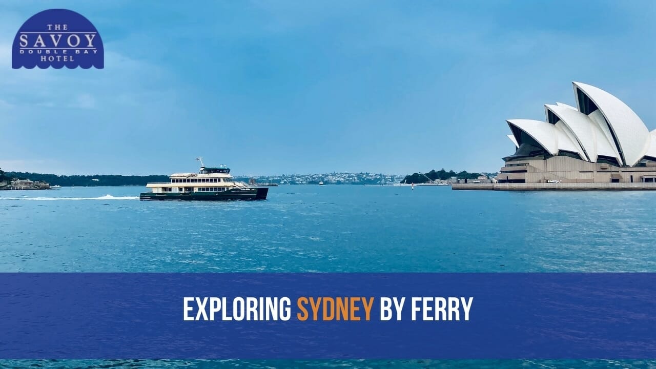 A classic green and yellow Sydney ferry cruising across the harbour water.