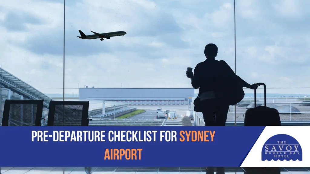 Sydney Airport Hours, Tips and Overnight Guide - Sydney Airport Silhouetted traveller with luggage standing in an airport terminal, looking out large window at an airplane taking off.