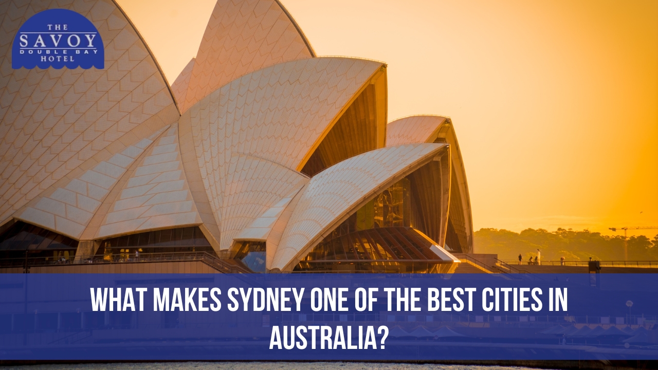 Iconic Sydney Opera House bathed in a warm, golden sunset glow.